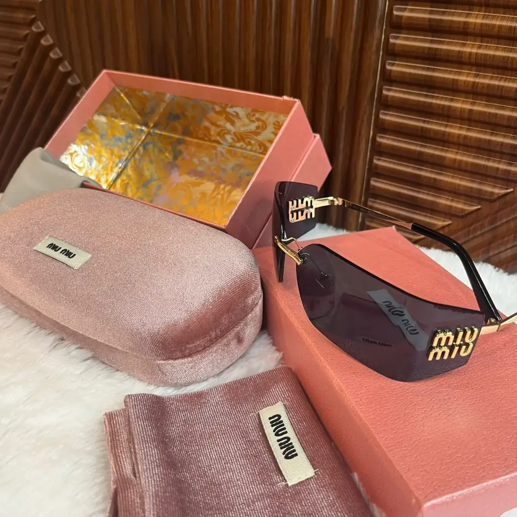 MIU MIU Lentes Runaway Negro