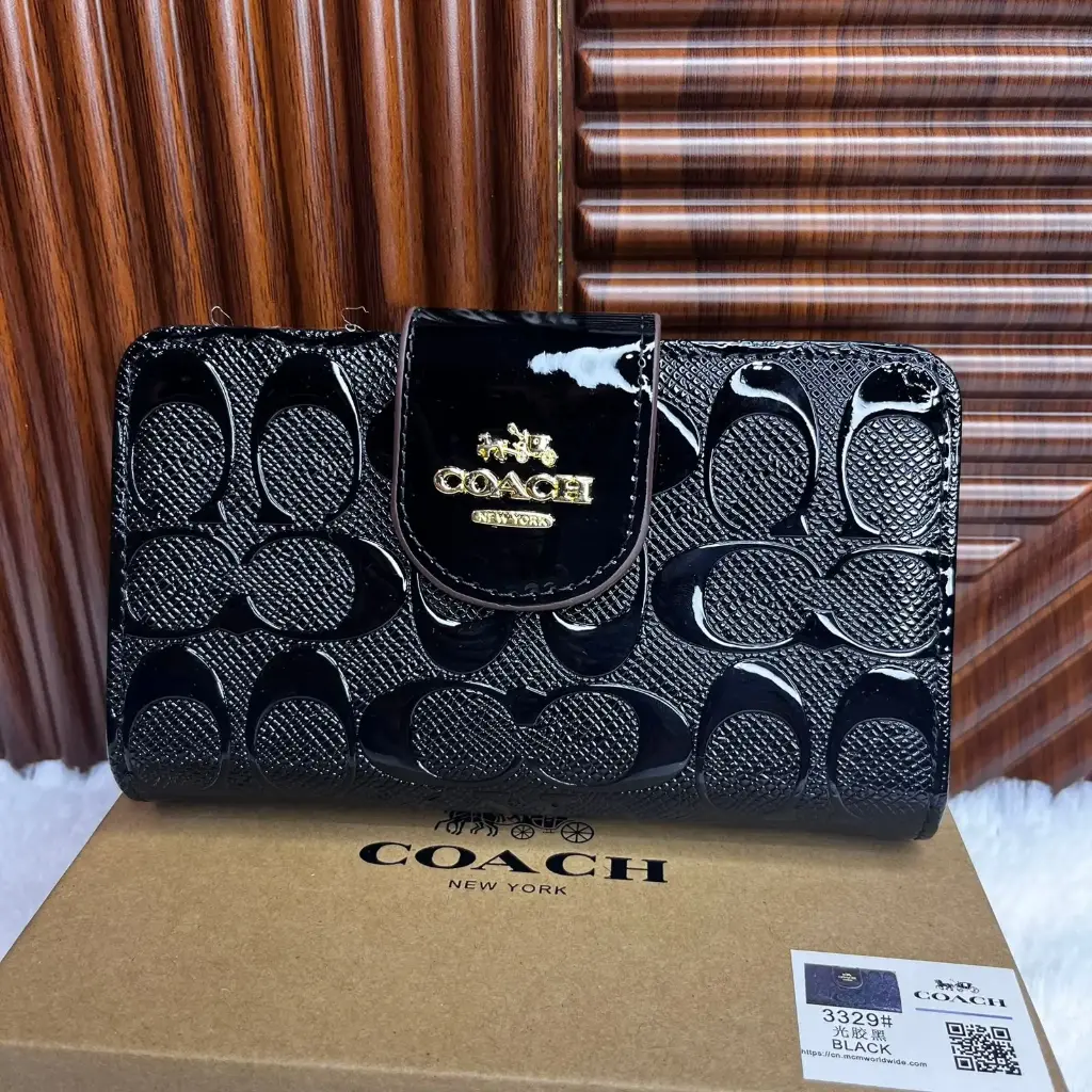 COACH Cartera Mediana Relieves Negro Charol