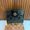 COACH Cartera Chica Relieves Negra Charol