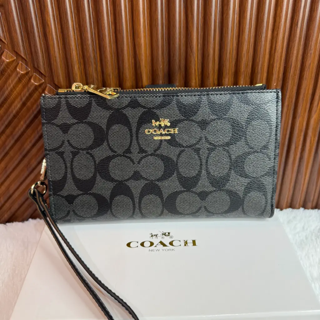 COACH Cartera Muñequera Porta Celular Negra Holograma