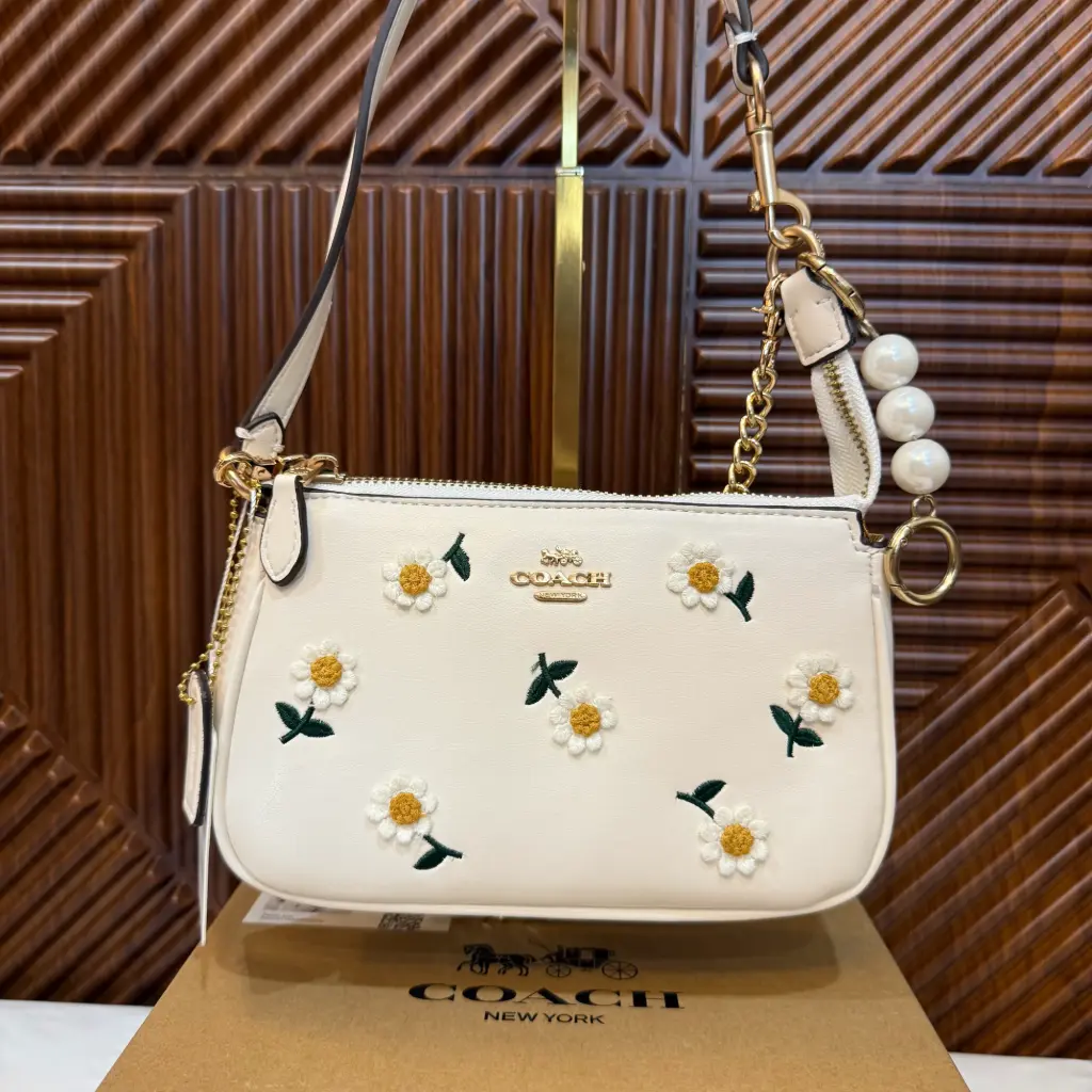 COACH Bolsa Nolita Floral Blanco hueso