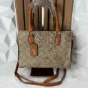 COACH Bolsa Maggie Café Claro Holograma