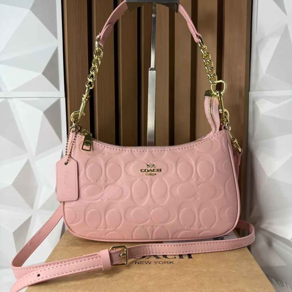 COACH Bolsa Teri Con Relieve Rosa