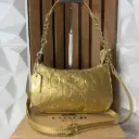 COACH Bolsa Teri Con Relieve Dorada