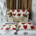 COACH Set Bolsa Sobre con Carteras Corazón Blanca
