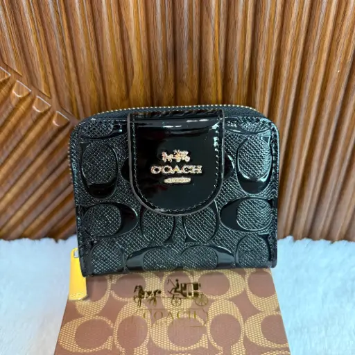 COACH Cartera Chica Relieves Negra Charol