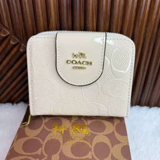 COACH Cartera Chica Relieves Blanca Charol
